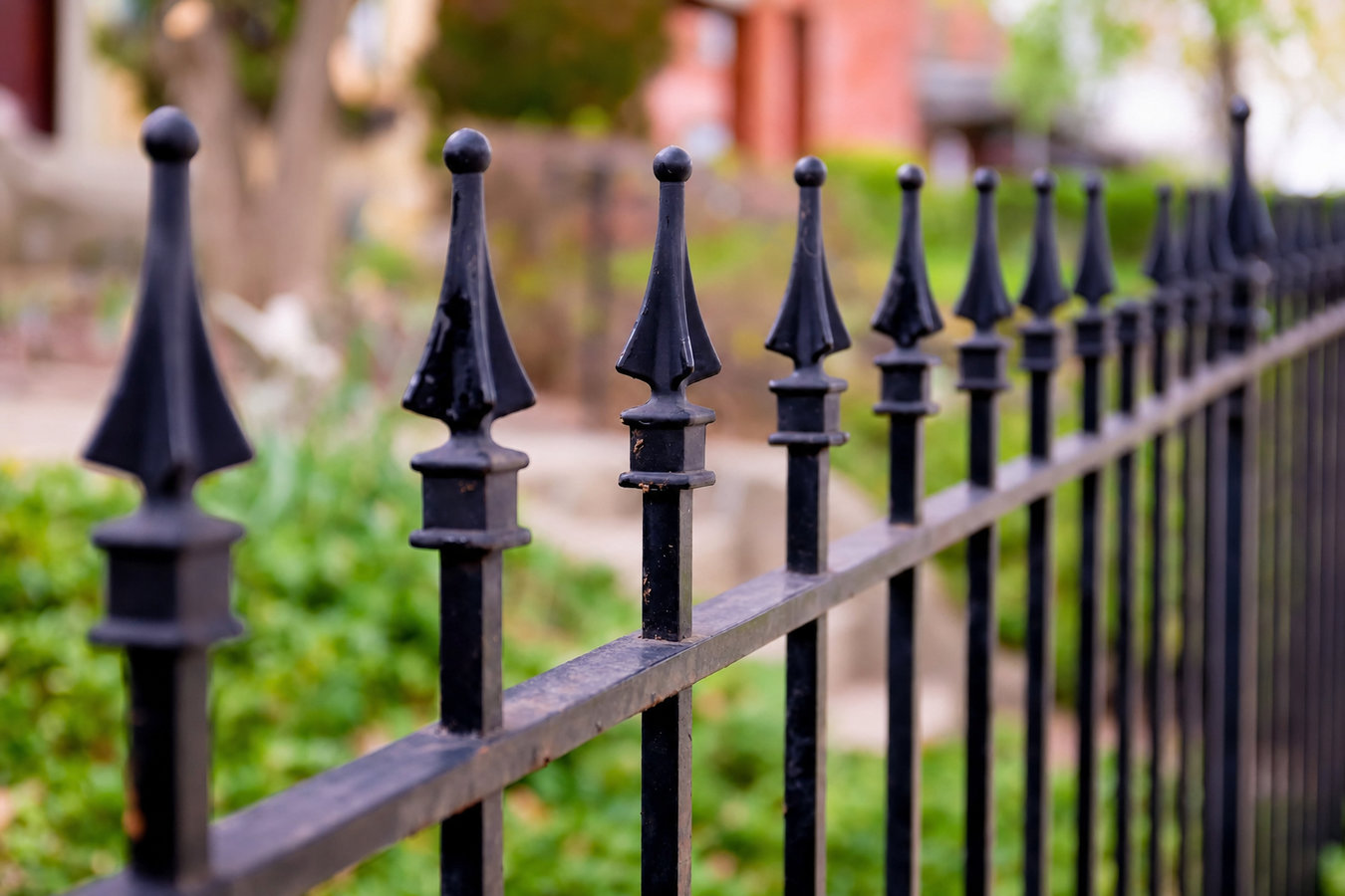 Ornamental iron fence installation